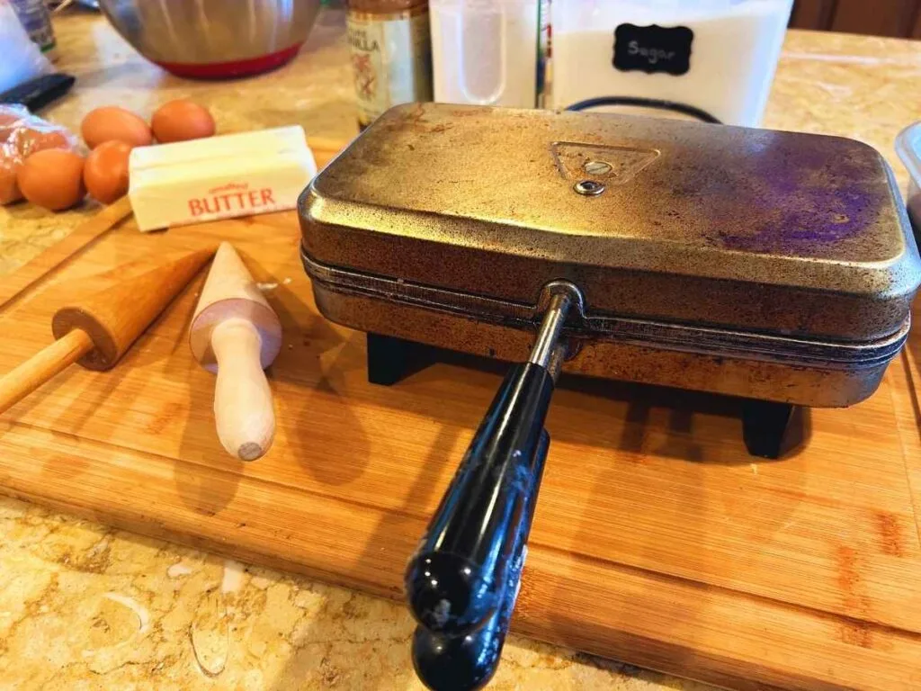 krumkake ingredients and tools laid out on the counter