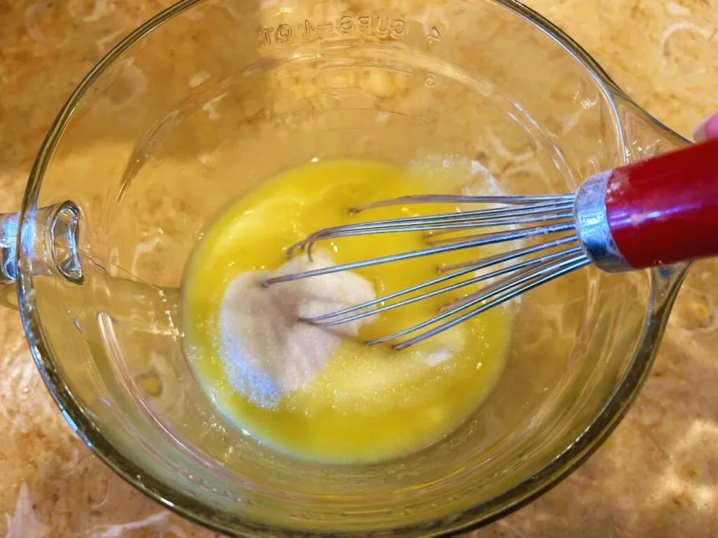 melted butter and sugar mixed together with whisk