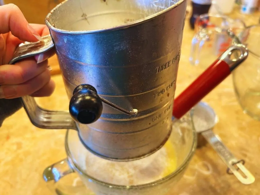 vintage metal sifter for flour