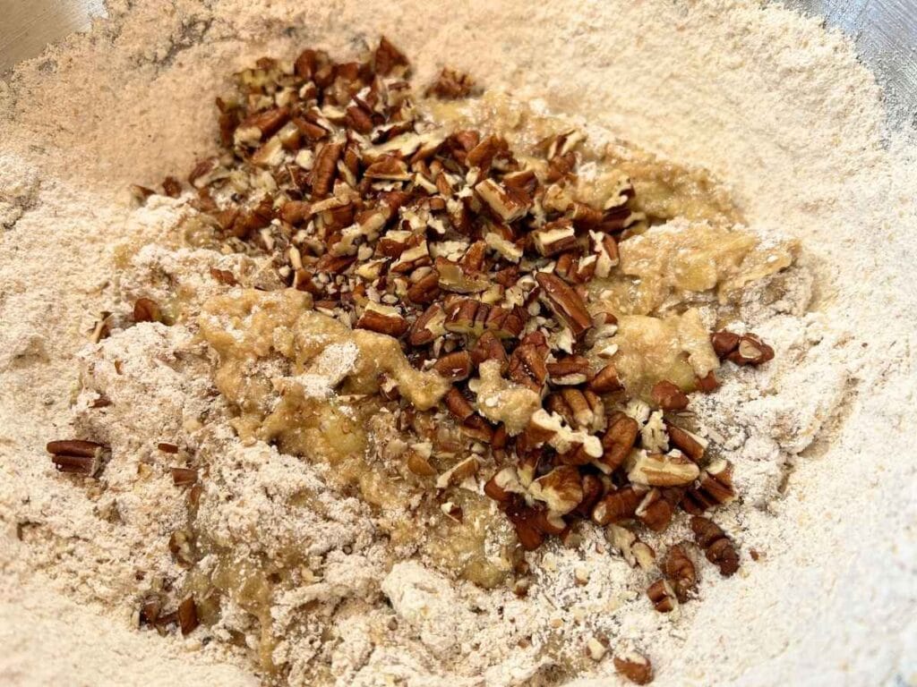 chopped pecans added to flour and wet ingredients