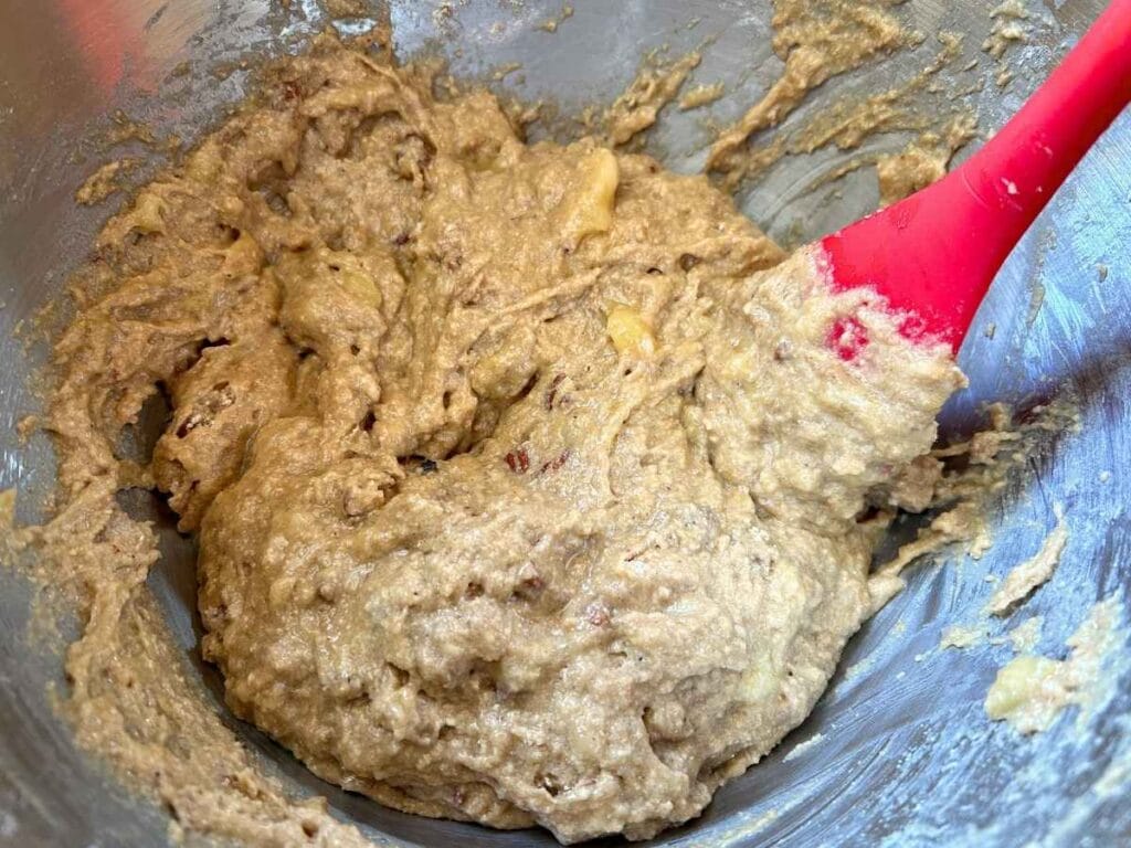 maple pecan banana bread batter in a mixing bowl