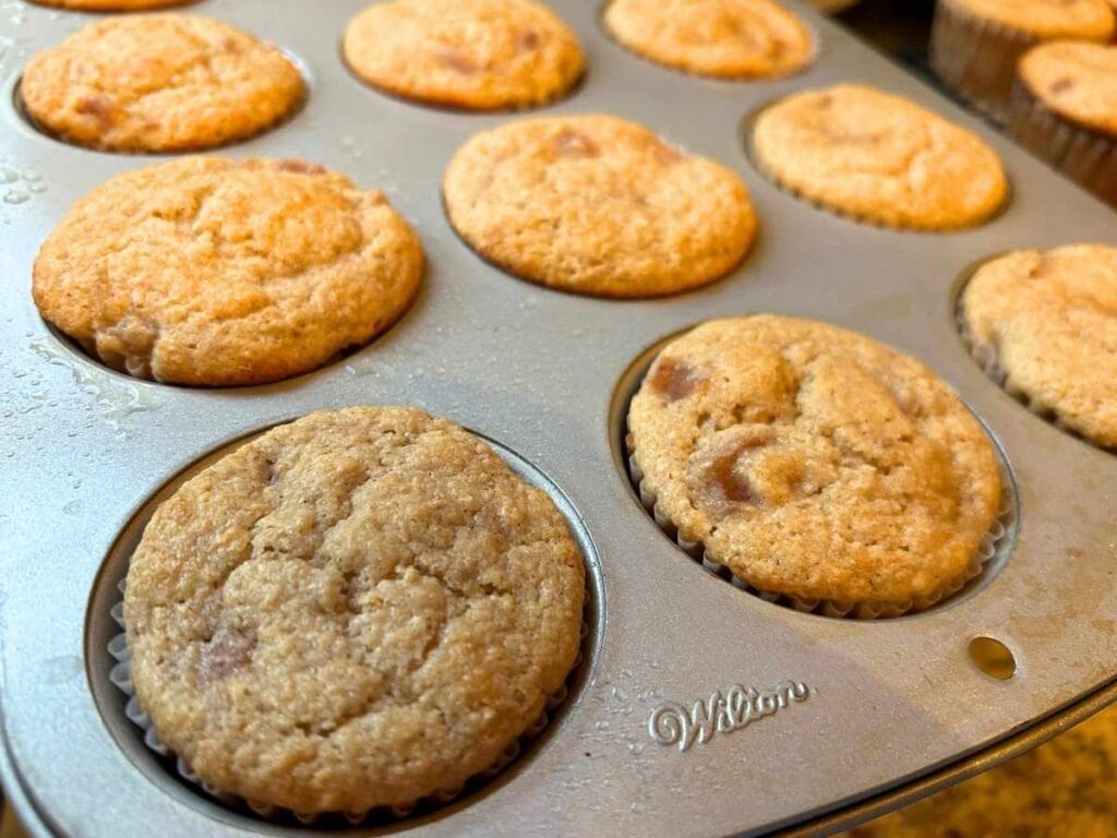 baked apple pie cupcakes in muffin pan