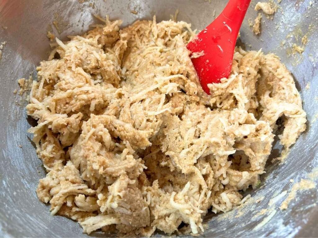 shredded apples folded into batter