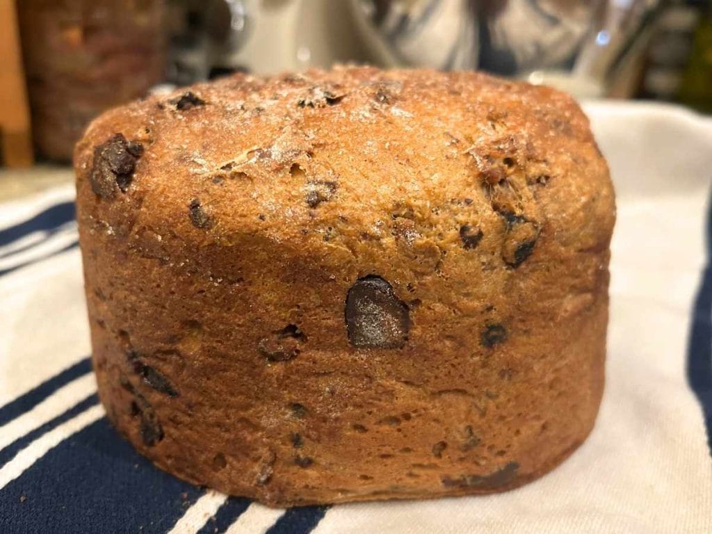 close up of a baked cherry chocolate panettone loaf