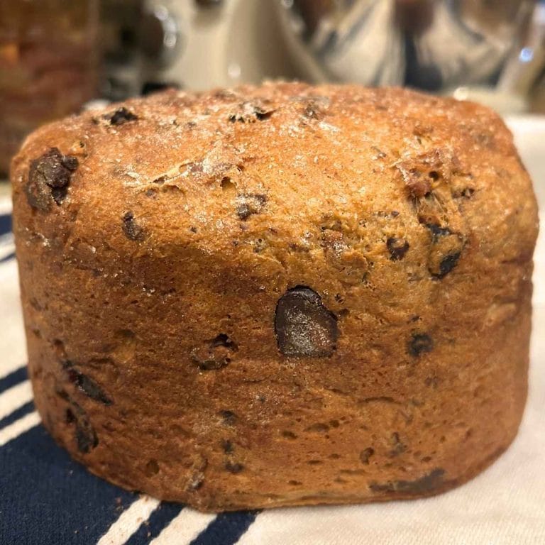 close up of a baked cherry chocolate panettone loaf