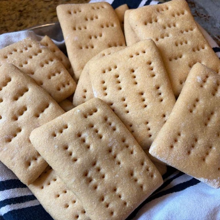 sandwich thins made with fresh milled flour in a towel line basket