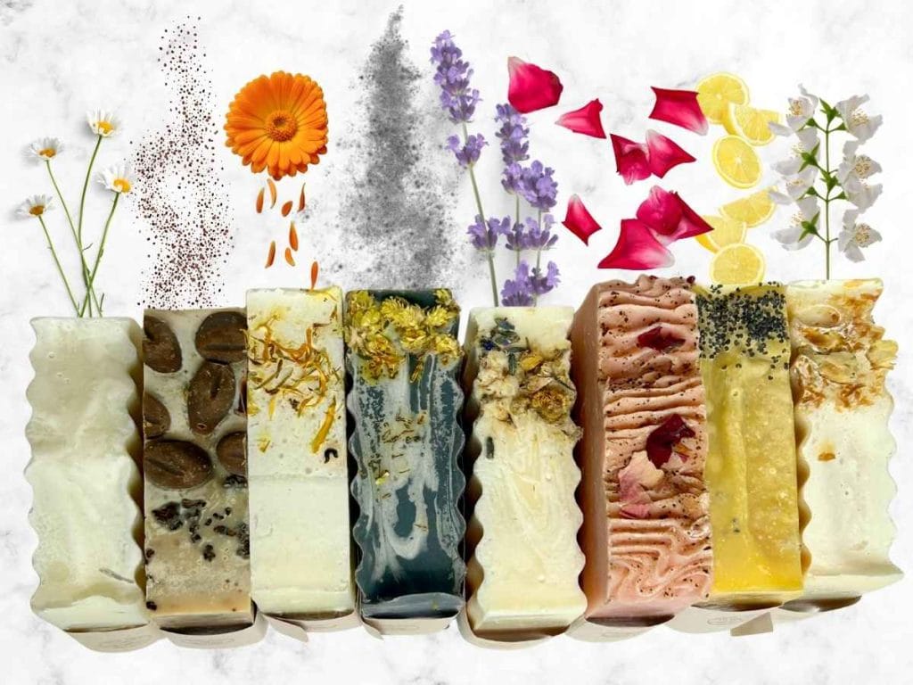 bars of homemade tallow soap with the ingredients spilling out next to them
