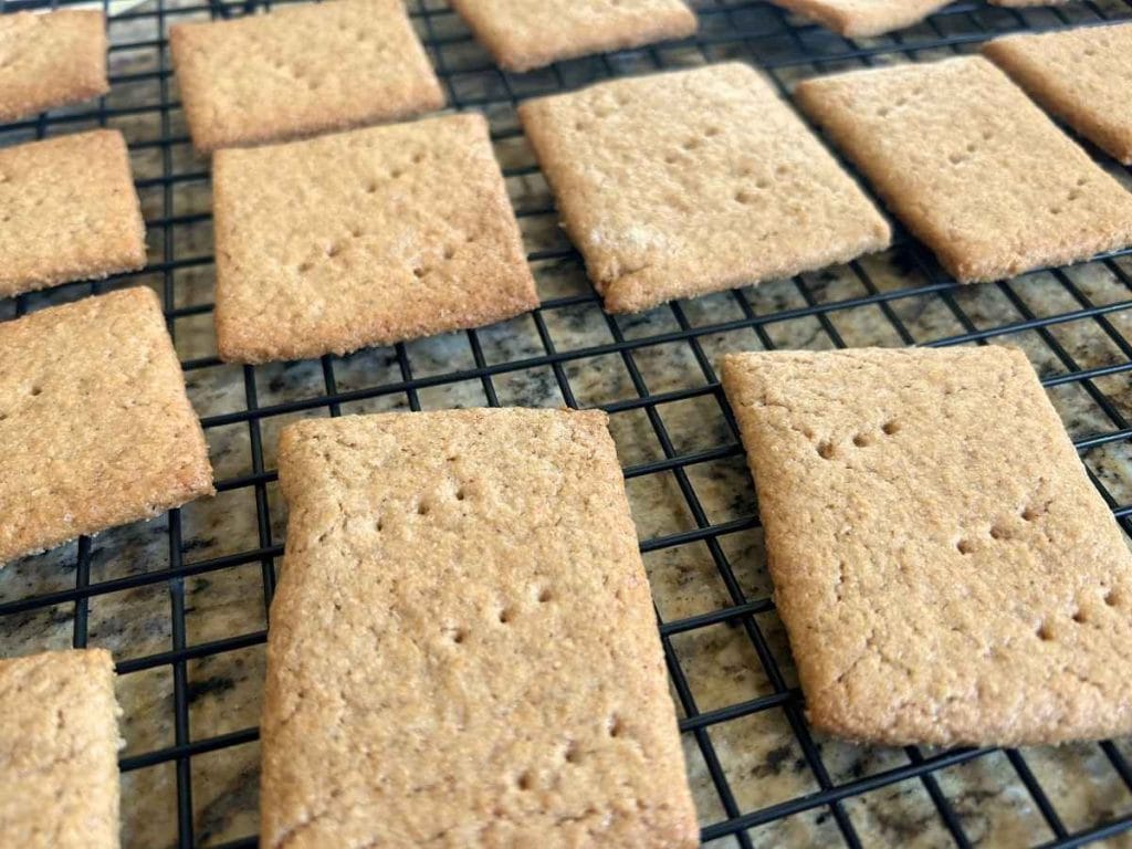 baked fresh milled flour graham crackers on a cooling rack